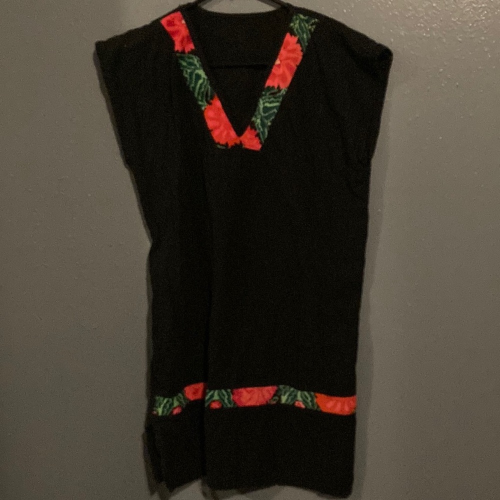 A Mexican style black with red roses dress